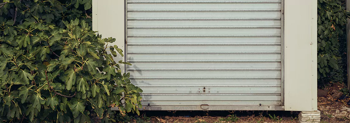 Overhead Garage Door Water Damage Repair in Riverdale, Ontario