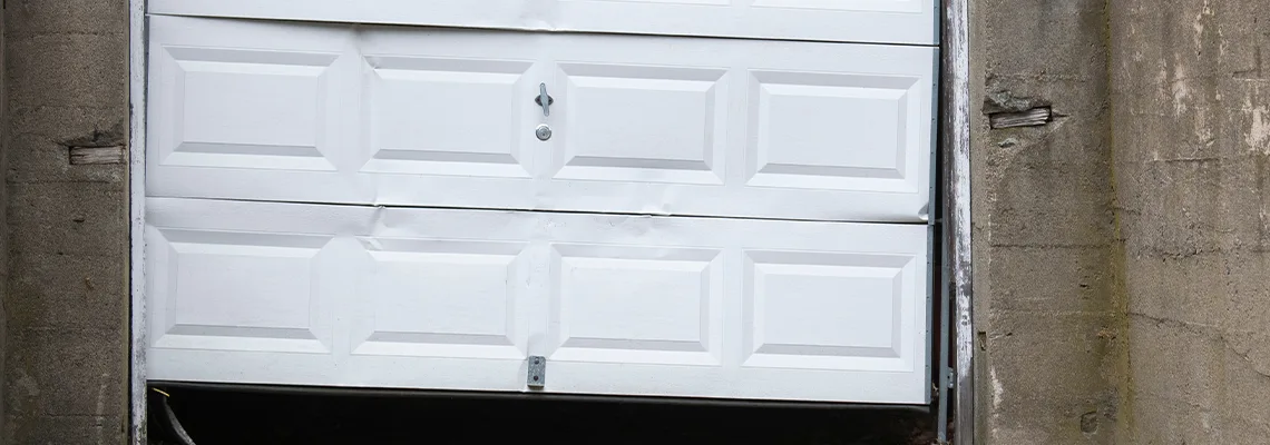 Garage Door Got Hit By A Car Dent Removal in Pitt Street, ON